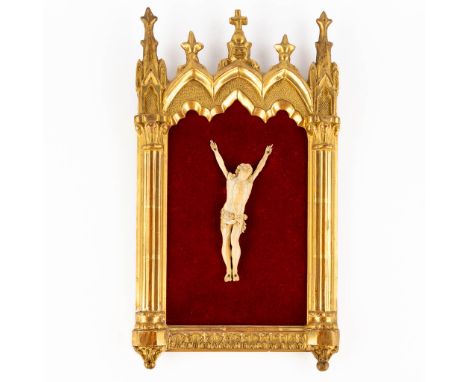An antique 'Corpus Christi', sculptured ivory, mounted in a gilt wood frame, 19th century. CITES certificate: 2023/BE04026/CE