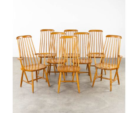 Two armchairs and six chairs, in the style of Ercol, probably Northern-Europe.&nbsp;Dimensions: (L:54 x W:68 x H:102 cm)
