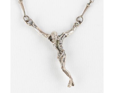 After Salvador DALI (1904-1989) 'Christo' a silver pendant.&nbsp;Dimensions: (L:44 cm)