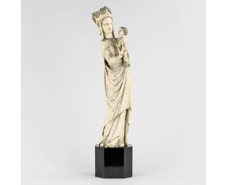  An antique sculpture of Madonna with a Child, Ivory, France. 19th century. Circa 1860-1880. Total gross weight: 5,049kg. Cer