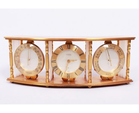 Tisch-Uhr mit Wetterstation, Angelus, Schweiz, 20.Jh. Metall, vergoldet, in gewölbter Halterung, rundes Uhrengehäuse, goldfar