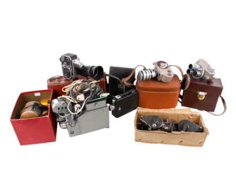 A collection of assorted vintage cine film cameras. Including a Bolex Paillard P1 Zoom Reflex outfit and a Bell & Howell 605,