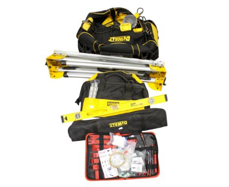 A collection of Dewalt accessories. Including two tool bags, a DE7035 folding work support stand and a Stanley spirit level, 