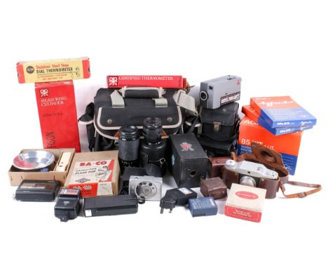 An assortment of cameras and photography equipment. Including a Kodak C93564, a boxed Agfacolour 85KIT, Purma 'Plus', boxed t