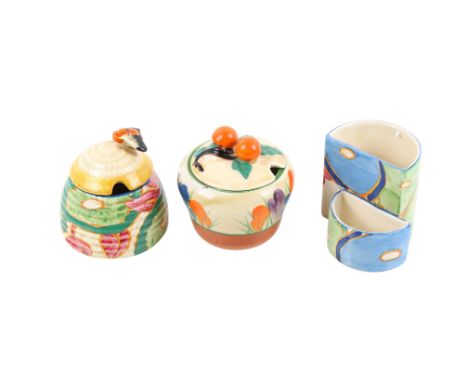 A group of three Clarice Cliff ceramic items. Including Bizarre Fantasque match strike and holder, H6.5cm, etc. Condition Rep