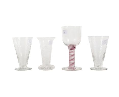 Three drinking glasses and a small vase. Comprising a pair of ale glasses in the Wrythen pattern, a Caithness wine glass with