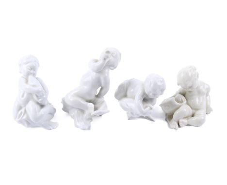 A group of four Bing and Grondahl figurines. Blanc de chine 'sea-children' Max. H11cm