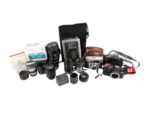 A collection of assorted vintage cameras and accessories. Including a Fostex FR-2LE Field Memory Recorder, etc.