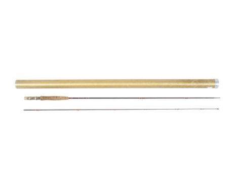 A collection of five fishing rods. A Hardy Delux 7' carbon trout fishing rod. In a metal container; a Hardy Glaskona 8' fly r