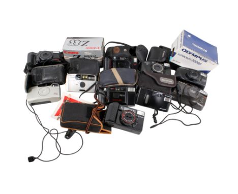 A collection of assorted vintage compact film cameras. Including Minolta, Ashika, Pentax, etc, most with cases. 