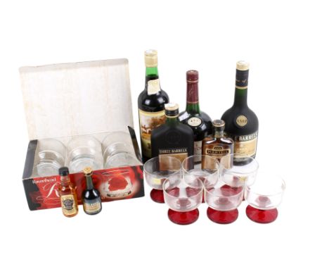 A group of assorted cognac and drinking glasses. Including Courvoisier 3 Star Luxe, 680ml, Raynal & Co VSOP Three Barrels 70c