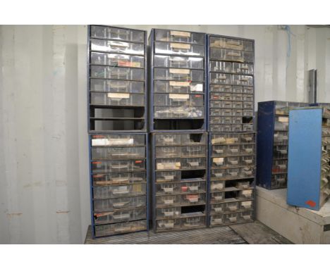 A selection of blue wall draws with various tools and accessories.