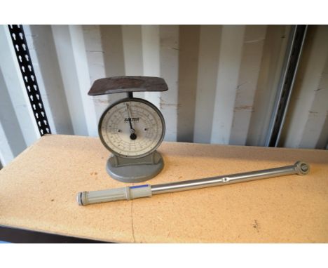 A Norbar torque wrench a pair of salter scales.