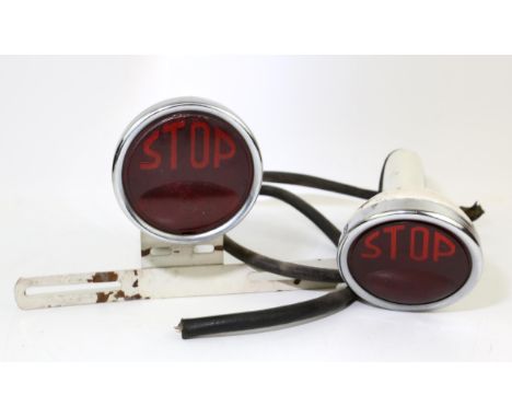 Pair of white enamel stop lights, one with bracket, 9cm red Perspex "STOP" lenses Length 27cm 