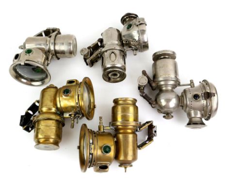 Pair of brass Lucas Calcia Club carbide cycle lamps, a similar Chrome plated lamp, a Powell & Hanmer New Sultan cycle lamp an