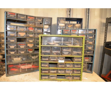 A selection of blue wall draws containing various tools and accessories.