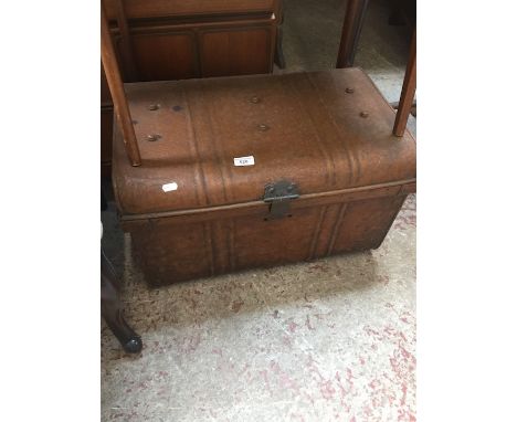 A vintage tin travel trunk 