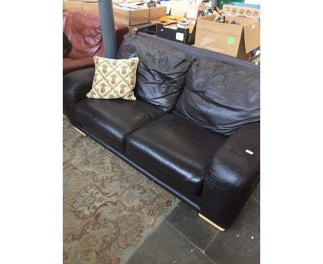 A Brown leather 3 seater sofa 