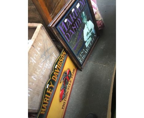 An advertising mirror and a Harley Davidson wooden display 
