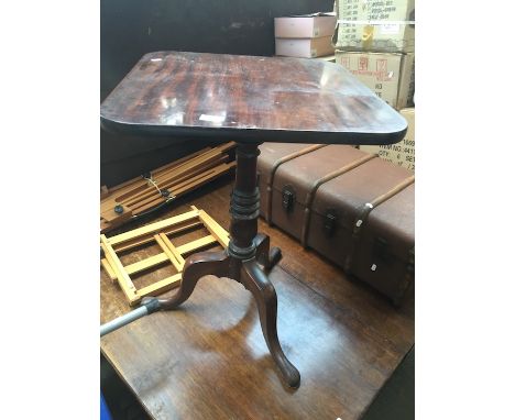 A Georgian mahogany tripod table on pad feet 