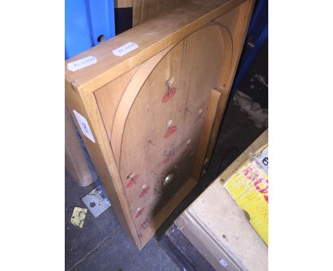 A wooden bagatelle 