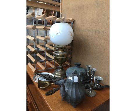 An oil lamp, pewter and other items 