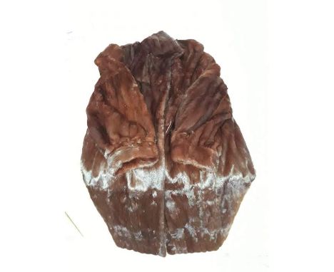 A full length ermine fur jacket. 
