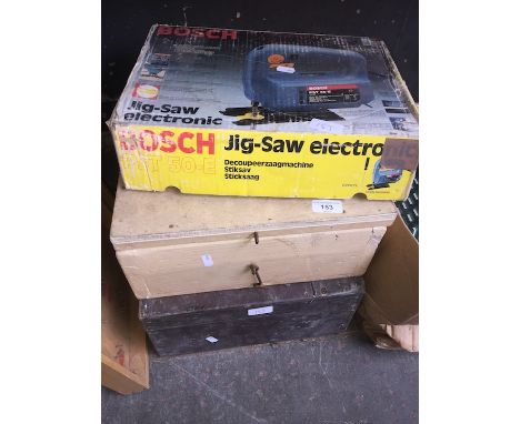 Two wooden tool boxes with tools and a Bosch jigsaw 