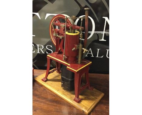 A Rider Ericsson Hot Air Engine Model. A Rider Ericsson Hot Air Engine with integral burner and water pump. Untested with som