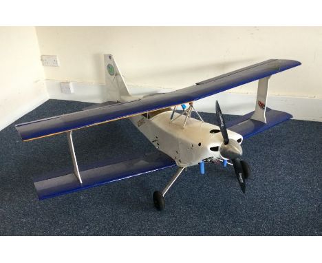 A scratch built Aerobatic model aircraft with blue wings. Est. £30 - £50.