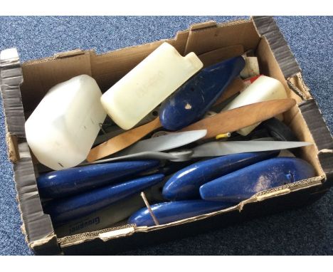 A box containing model aircraft propellers etc. Est. £10 - £15.