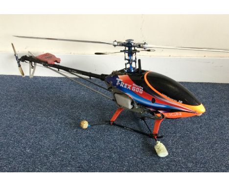 A petrol driven remote control model helicopter. Est. £30 - £50.