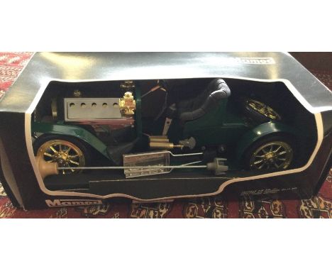 A Mamod model of a car in original box. Est. £30 - £50.