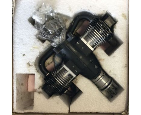 A boxed aircraft engine. Est. £10 - £20.