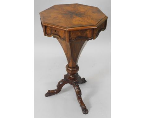 A Victorian rosewood trumpet shaped workbox, the octagonal top veneered in triangular segments, enclosing a fitted interior w