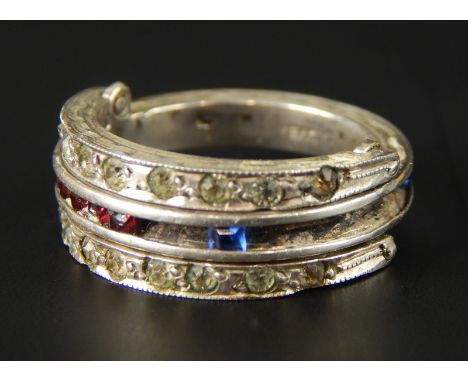 A silver three row dress ring, each row set with white, blue and red stones, 5.1g all in. 