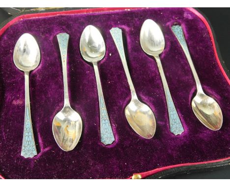 A set of six George IV silver and pale blue enamel coffee spoons, Birmingham 1944, maker's mark L & S, in fitted case for Ash