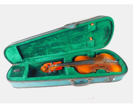 A violin, the interior with paper label for Stradivarius, two piece back, length of , back 34cm long, in a fitted case