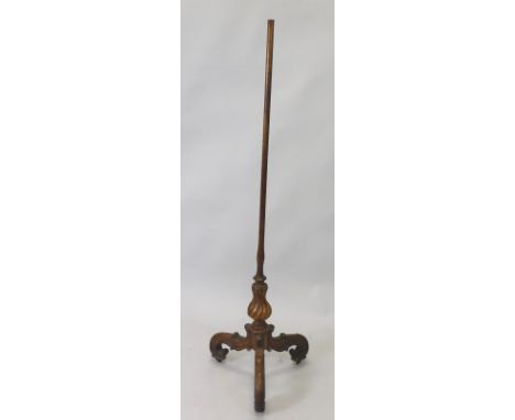 A 19thC mahogany pole screen base, with a cylindrical section, a wrythen carved baluster, and scroll carved tripod base, 155c