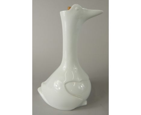 A Continental porcelain decanter in the style of Edouard Marcel Sandoz, modelled in the form of a duck or goose, with cork st