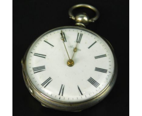 A Continental engine turned white metal fob watch, the enamel dial with Roman numerals and stamped with the number 29106, the