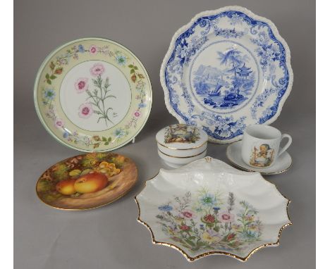 A collection of porcelain, to include a Royal Worcester side plate painted with fruit by H Freeman, an Elkin Knight & Co prin