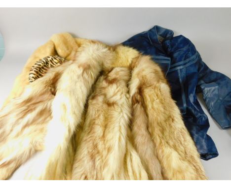 A fur jacket, a blue size 42 leather and fur coat, various hats etc.