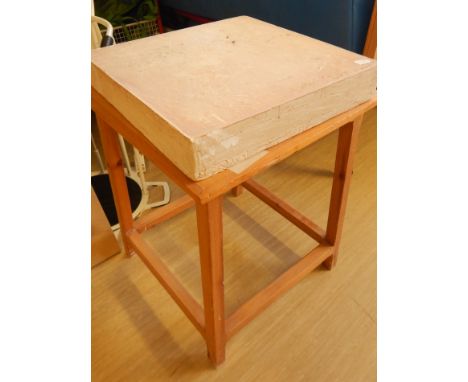 A pottery or ceramic preparation slab, 54cm x 54cm, on a pine stand, 72cm high, 61cm deep, 61cm wide.  Viewing strictly by ap