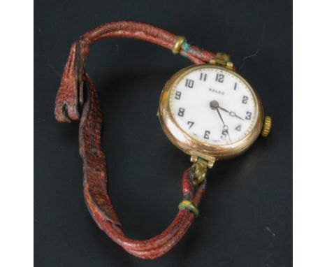 A Rolco Rolex gent's wristwatch, with circular dial, white enamel dial, with small crack, from 9 to 12, gold embellished surr