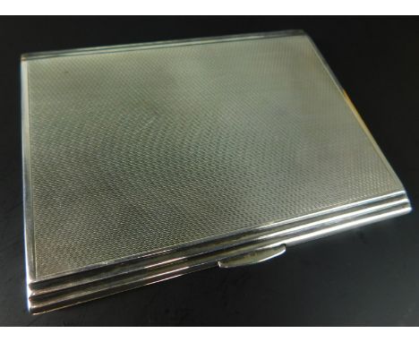 A George VI art deco silver cigarette case, with engine turned case, Birmingham 1939, 5 3/4 oz