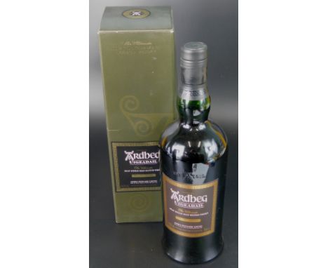 A bottle of Ardbeg Ultimate Islay single malt Scotch whisky, boxed