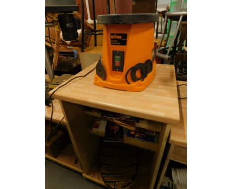 A Triton electric oscillating spindle sander and two metal stable hay storage racks and a stand