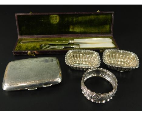 A collection of small silver, to include a pair of salts, a similar napkin ring, a christening set, small cigarette box and a