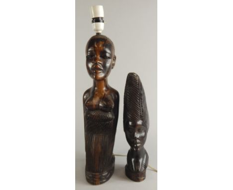 Tribal art.  Two hardwood carvings, one later converted to a table lamp, 40cm high